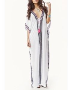 Moroccan-Inspired Embroidered Kaftan Dress for Bohemian Chic Statement.