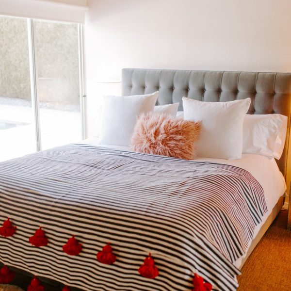 Handcrafted Black and White Moroccan Pom Pom Blanket