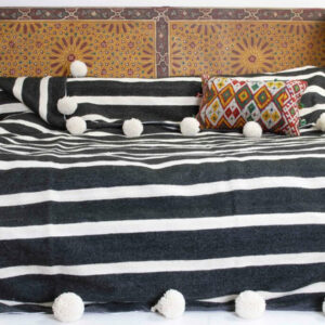 Striped Black and White Pom Pom Moroccan Blanket in Handwoven Cotton