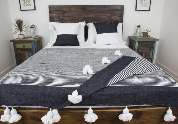 Hand-Woven Black and White Moroccan Pom Pom Blanket