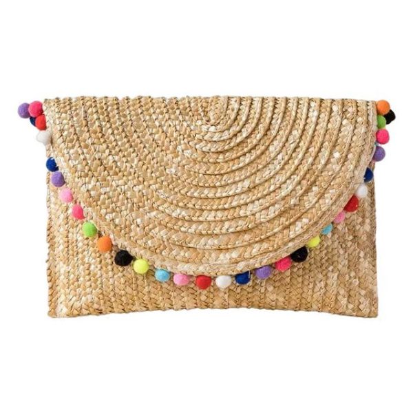 Moroccan Handwoven Straw Pom Pom Clutch