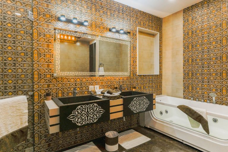 Bathroom lined in gold zellige