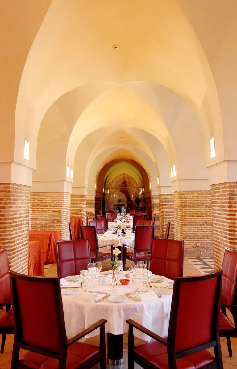 Vaulted room, red seating